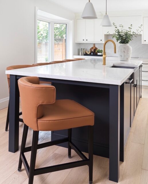 Raise your hand if your kitchen feels too small for the life happening inside it.
⠀⠀⠀⠀⠀⠀⠀⠀⠀
That’s exactly what Megan and Jordan were dealing with. Four growing kids, a large dog, busy mornings, and a kitchen that simply wasn’t keeping up anymore. 
⠀⠀⠀⠀⠀⠀⠀⠀⠀
The house itself wasn’t small, but the way the spaces were organized no longer worked for the family they had become.
⠀⠀⠀⠀⠀⠀⠀⠀⠀
What I love about this project is we started by understanding how this family actually lived. Where did everyone gather? What caused daily frustration? Why did meals feel cramped?
⠀⠀⠀⠀⠀⠀⠀⠀⠀
After exploring several floor plan options, we expanded the kitchen into the old dining room, creating an oversized island where all six family members can comfortably gather. Today, mornings run smoother, meals feel less hectic, and the kitchen finally supports the life happening around it.
⠀⠀⠀⠀⠀⠀⠀⠀⠀
If a kitchen renovation has been sitting on your wish list for far too long, reach out through the link in bio.
⠀⠀⠀⠀⠀⠀⠀⠀⠀
Interior Design @mcnicolinteriordesigns
Photography @arnalphotography
⠀⠀⠀⠀⠀⠀⠀⠀⠀
#oakvilleinteriordesigner #kitchenrenovation #mcnicolinteriordesigns