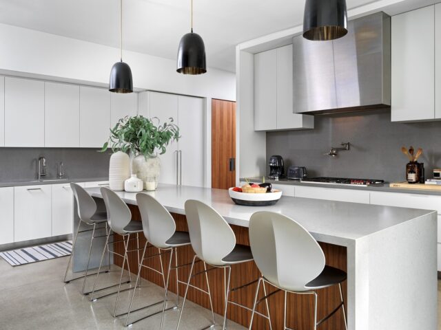 One of the challenges with a modern kitchen is making sure it still feels warm.

For Project Niagara, we kept the white cabinetry and grey countertops simple, then brought in walnut on the island and surrounding cabinetry to warm everything up. It’s a combination I love because you still get that bright, uncluttered feeling people often want from a modern kitchen, without the space feeling stark. 

And when you’re working with an open kitchen that’s part of the main living space, that warmth matters even more. You want it to feel like it belongs in your home, not like a showroom.

Interior design by @mcnicolinteriordesigns
Photography by @arnalphotography

📍McNicol Interior Designs | Toronto Interior Designer