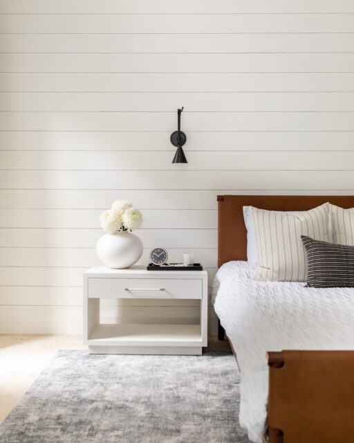 Same project, two bedrooms, different personalities. And I love that. One Ashburn bedroom feels warmer and a little more relaxed—the leather bed, white shiplap, stripes and black accents give it that casual, lived-in character.

And that’s exactly how bedrooms should work. You don’t need to carry one identical decorating formula through every room just because they’re under the same roof.

Photography by @simplycurateco
⠀⠀⠀⠀⠀⠀⠀⠀⠀
📍Toronto Interior Designer
#bedroomaesthetic #torontointeriordesigner #homerenovation