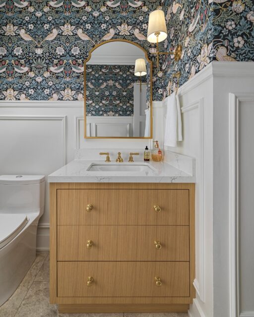 I don't know about you, but I love when I visit someone's house and their powder room is a whole little experience. You know the ones. You pop in to wash your hands and suddenly you're inspecting the wallpaper, admiring the taps and wondering where they found that mirror.

That's the kind of personality I love bringing into these smaller spaces. At Project Abbey, we've got birds and botanicals covering the upper walls, beautiful brass details, a warm wood vanity and traditional panelling tying everything together.

Photographer @arnalphotography
⠀⠀⠀⠀⠀⠀⠀⠀⠀
📍Oakville Interior Design
#oakvilleinteriordesigner #powderroomaesthetic #homerenovation