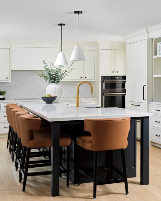 Four kids will expose every single thing that DOESN’T work about your kitchen. Quickly. Project Bronte’s family had simply outgrown theirs.

There wasn’t enough room for all six of them to sit together, so even everyday meals meant heading into the formal dining room. The solution wasn’t squeezing a slightly bigger island into the same footprint. 

We actually expanded the kitchen into the old dining room space and moved the dining room elsewhere. That gave us room for this generous island—and now everyone has a seat.

Interior Design @mcnicolinteriordesigns
Photography @arnalphotography
⠀⠀⠀⠀⠀⠀⠀⠀⠀
#oakvilleinteriordesigner #kitchenrenovation #mcnicolinteriordesigns